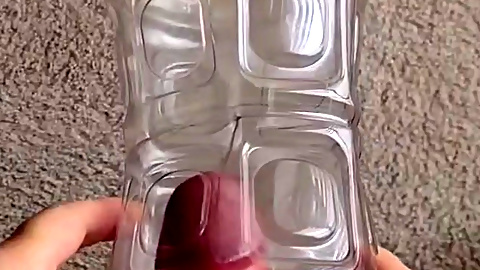 Exhibitionist masturbator demonstrates getting cock sucked by plastic bottle