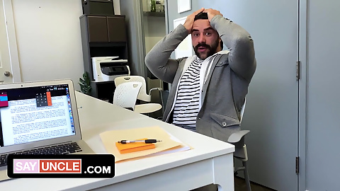 Two muscular coworkers are stuck in the office during lockdown and find a distraction from boredom