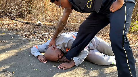 Vigilante Humiliating the Worker