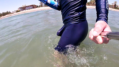 Surfer Gets Erect in His Lycra for the Pleasure of the People